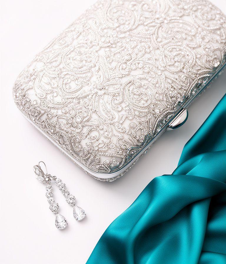 Close up of luxury jewelry and fabric for event planning